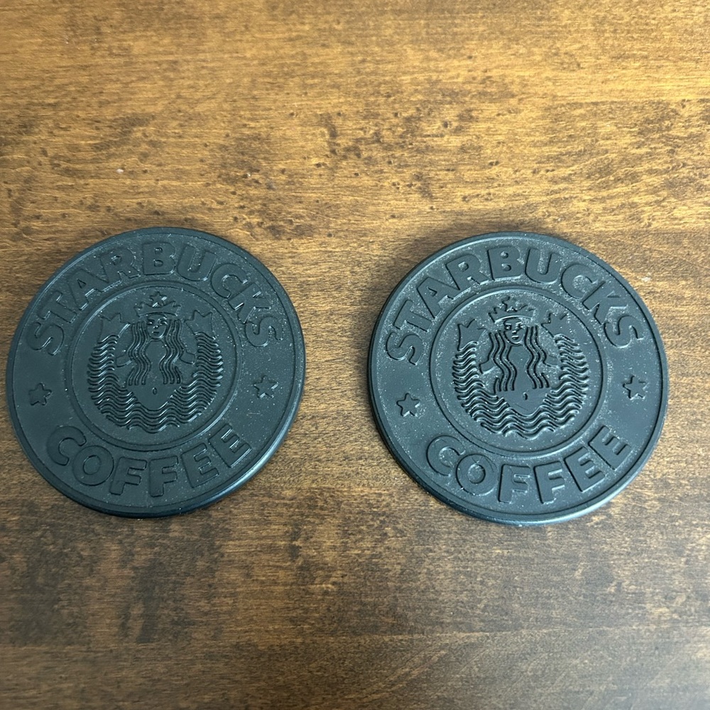 Set of two 1988 rubber Starbucks black coasters